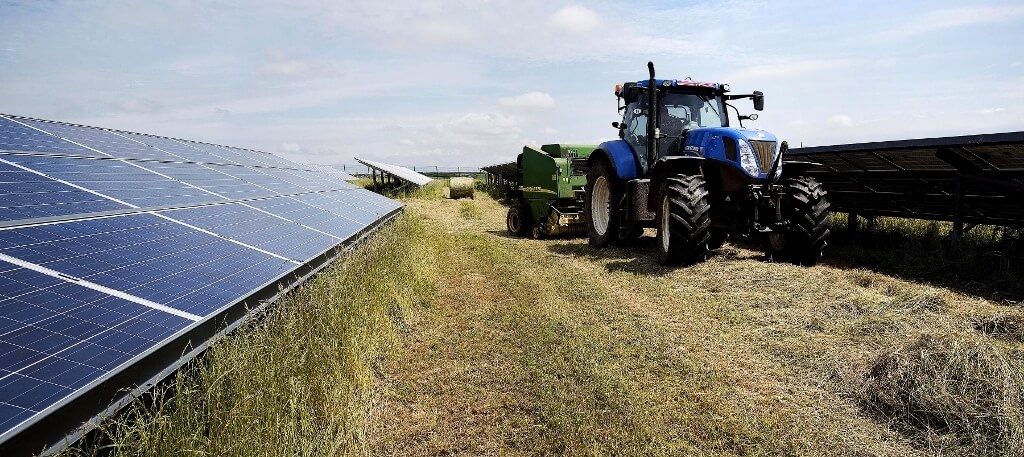 Tractor in a solar farm