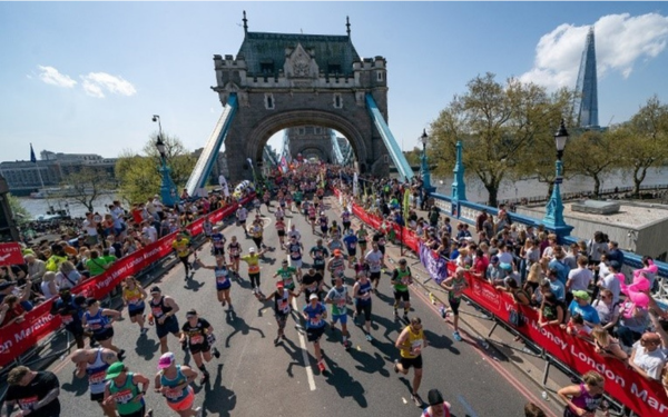 Runners over bridge