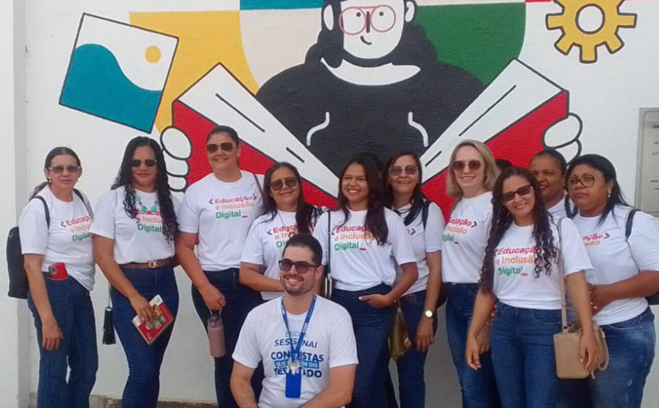 Group photo of the teachers outside the school